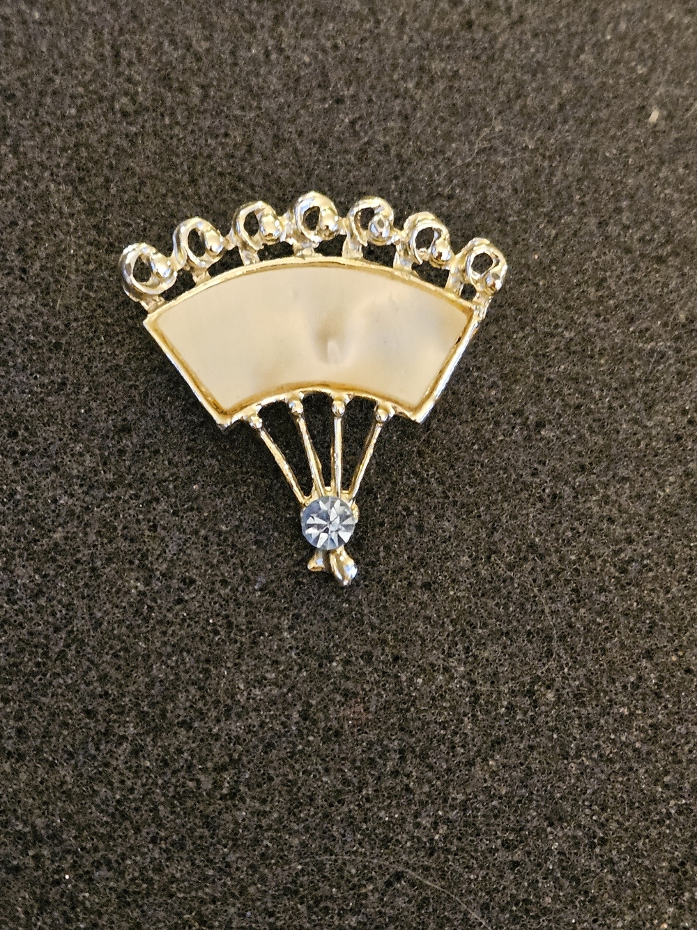 Gold and Cream Fan Brooch with Blue Crystal Accent.